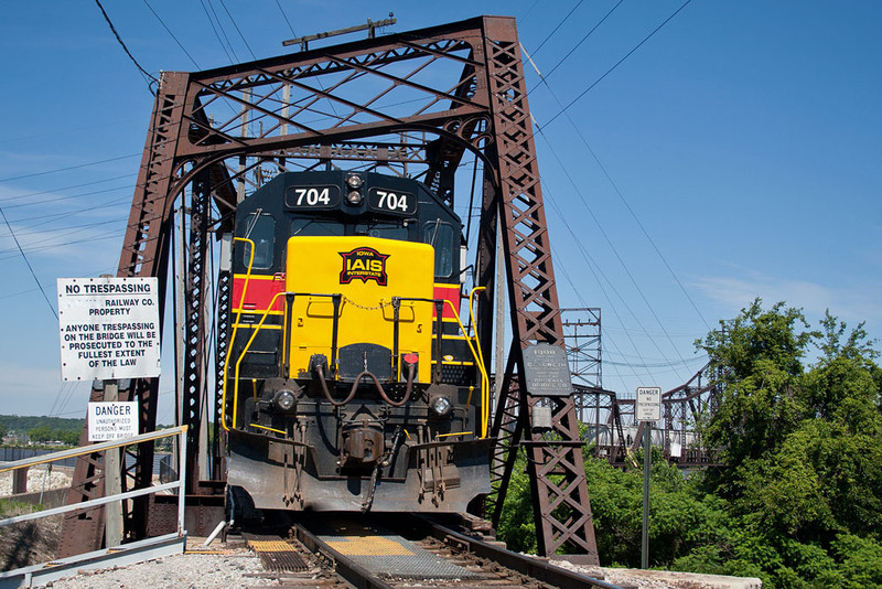 The caboose, IAIS 704, enters the Crescent Bridge.  Rock Island, IL.