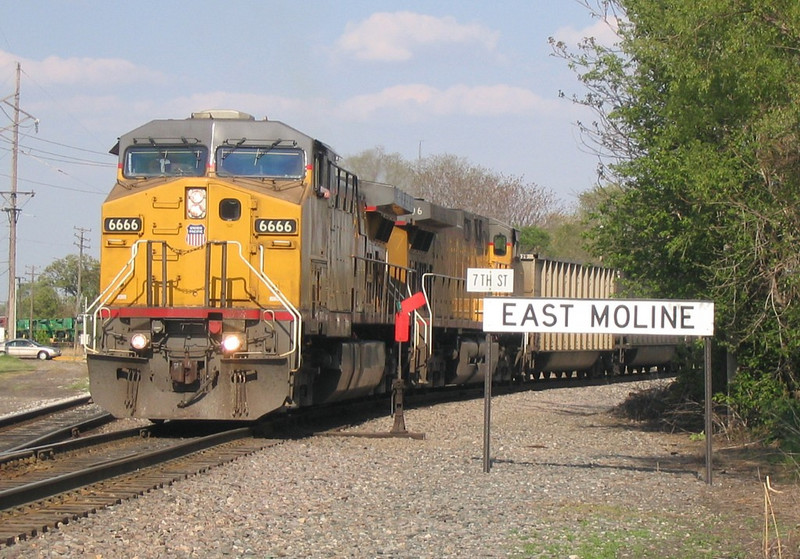 UP 6666 West, CPWNA-04, jumps onto the "BN Industrial" at East Moline, IL on 5/5/05.
