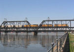 UP 6863 West, CPWNA-02, crosses the Mississippi River in Davenport, IA on 5/5/05.