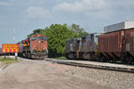 KCS 4609 heads west on the BN main with loads while BNSF 4727 holds with another set of KCS empties.  Rock Island, IL.