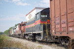 IAIS 250 tags along on BICB-03 at Taylor St in Davenport, IA.  September 4, 1999.