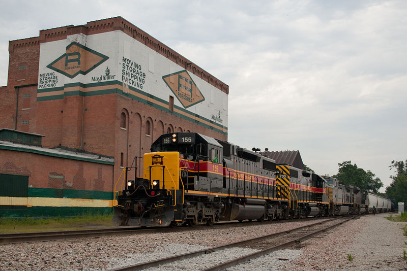 BICB-15 and a detouring KCS empty grain train are combined and head west out of Davenport, IA.  July 16, 2011.