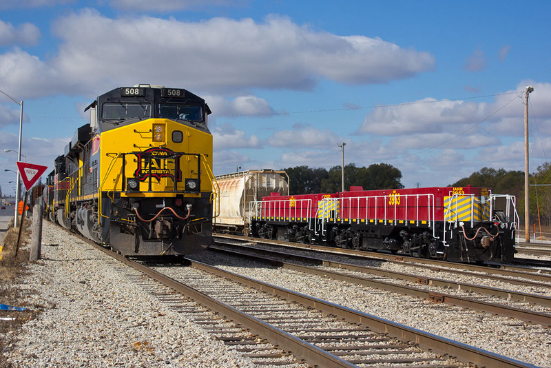 CBBI-28 @ Rock Island, IL passing new IANR slugs, 3953 & 3951.  October 29, 2014