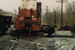 7966, later 466. The early days of changing a traction motor. I don't remember all the detail of the trolley, but there was a removeable section of track which would allow the truck assembly to be slid out for access to the motor. Also, look at the background (looking east from the northeast corner of the engine house just off of Webster Street). No track five or office building. Late March 1985.