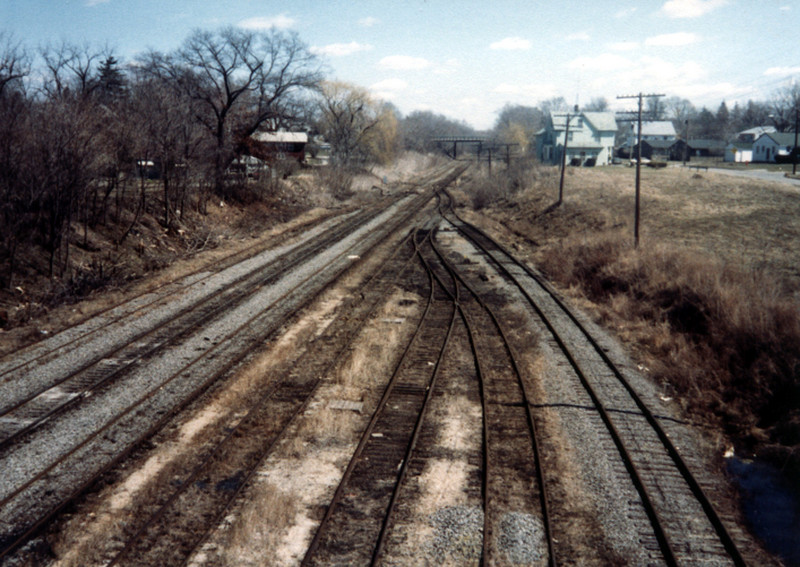 The IAIS yard in Iowa City looking east from the Dodge Street Bridge. I'm unsure of the exact date, but I think it was early 1984 before the IAIS possession.