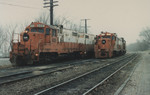 Four GP's idle in front of the Rock Island Depot at Iowa City in this November 1984 photo. Note the three tracks now down to one.