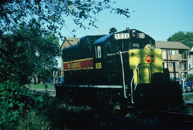 8036 (436) in it's original new paint and 4-digit number. Also note the red, modified hexagon "Iowa Interstate Railroad herald. Oct-1985"