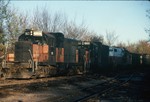 Ex-Milwaukees GP-20's 963 and 962 along with 469 getting ready to push a load of coal down the Hill Track to interchange with the CIC. Nov-1988.