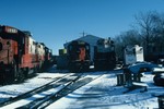 The west end of the engine house in Iowa City 5-Jan-1986. Note the dynamic brake unit (used for load testing generators and engines) to the right of the picture in front of 7957's hood.