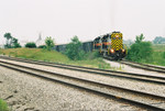 Switching sand cars at Ozinga, across from the Metra Hickory Creek platform, June 28, 2005.