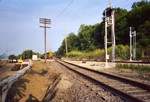 IAIS eastbound is about ready to cross the Ill. Railnet at Peru, June 28, 2005.