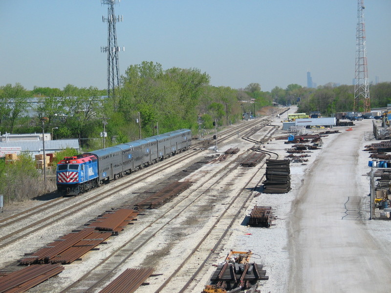 Southbound Metra approaching the Prairie St. (127th) stop on the old RI "suburban line."  April 26, 2006.  This time you can see the Sears Tower!