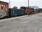 First car on the west train is one of Gerdau's TIMX covered gons.