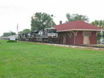 Sept. 17th's edition of the NS grain train passes the depot at Wilton.  It was nice to get one of these in daylight again, and the clouds actually helped dispell the backlighting.