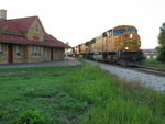 NS grain train passes West Lib. depot, Aug. 23, 2012.