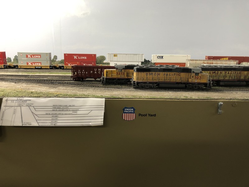 UP's South Pool Yard. On UP trackage at the far west end of the layout, UP shields are substituted for the IAIS heralds shown previously.  This yard serves as the Iowa Interstate's primary interchange point with the UP.