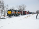 West train is cleared up at Walcott siding to meet the turn, whose feed and/or starch loads on the rear end are visible in the distance.