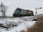 Eastbound Wilton Local crosses Highway 6 at Atalissa, Feb. 2, 2008.