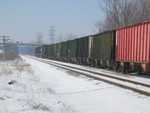 Looking west.  Some visiting (brave!) railfans are shooting from the overpass.