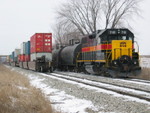 West train goes by the local at N. Star, Feb. 27, 2007.