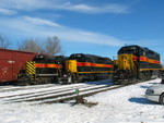 Iowa City lineup:  The westbound's setout (mostly CR stuff) is on the main, west train (468) is on the siding, CR job's power is on 1 track, and the roundhouse crew is moving 718 from 5 to 4 track.  Feb. 8, 2007.