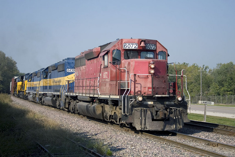 What was once the high-speed eastbound main of the Rock Island is now referred to as the Slow Track by the IC&amp;E, due to its lack of signalling and 10mph running.  IC&E's MKCSP heads for Nahant with IAIS 507 and IAIS 509 in tow at Linwood, IA.  26-Sept-2008.