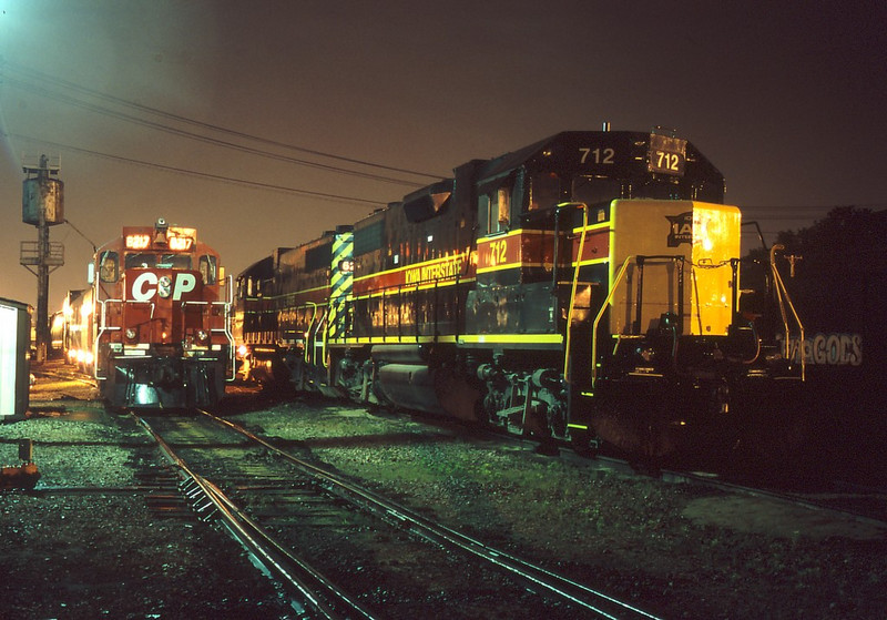 CP 8217 and the Geometry Train lay over for the weekend in Rock Island, IL next to IAIS 712 and 626 early in the morning on June 4, 2005.