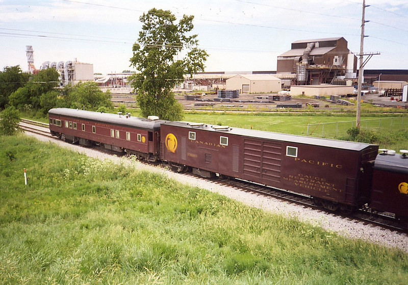 CP's "Gauge Restraint Measuring Vehicle" and Geometry car at Wilton, IA on 9-June-2005.