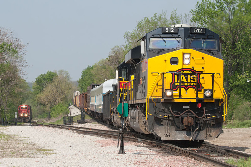 CBBI-09 drops down the hill as the Geo Train comes up the interchange.  Note the 2 RRDX coaches, they will be used at the Ipsco Steel mill for an employee appreciation weekend.