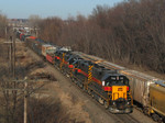 BICB-13 pulls down for headroom under US 61 (W River Drive) in Davenport to get ready for the reverse move up the Golden State Route.  14-Feb-2006.
