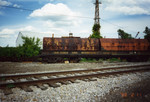 IAIS 12004 awaits scrapping at Del's Metals, Rock Island, along the Milan branch, Aug. 2004