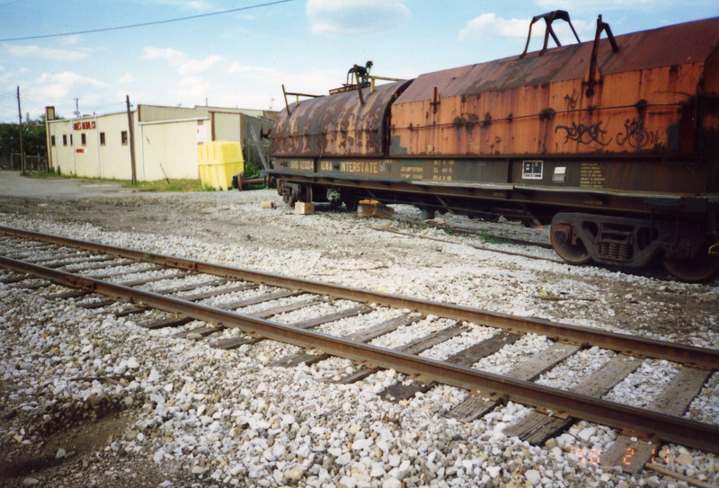 IAIS 12004 awaits scrapping at Del's Metals, Rock Island, Aug. 2004