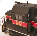 Atlas mistakenly added the red/yellow stripe to the top of 603's electrical cabinet air filter box (ECAFB) behind the cab, but a quick touch-up with Scalecoat 2 black corrected that.  Other than the 700-series GP38-2s, I believe 603 is the only IAIS unit to have an all-black ECAFB.