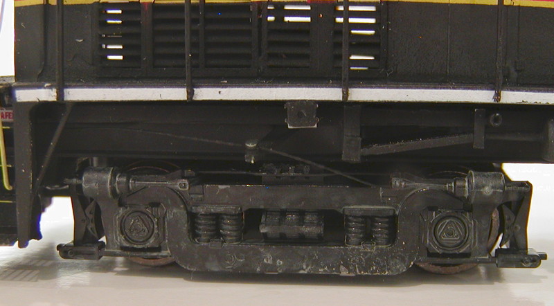 Right-rear truck sideframe details.  The Atlas U23B sideframes were replaced with newer Atlas C420 AAR-B sideframes, which are a direct replacement but with nicer detailing.