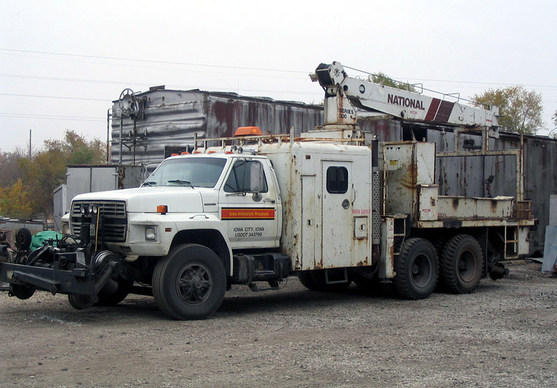 Ford L-series section gang hi-rail truck in Rock Island, IL on 5-Nov-2005.