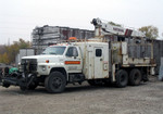 Ford L-series section gang hi-rail truck in Rock Island, IL on 5-Nov-2005.