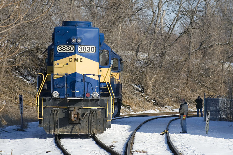 IC&E's West Davenport Switcher pulls past the derails on the interchange tracks at Division St in Davenport, IA.  18-Dec-2007