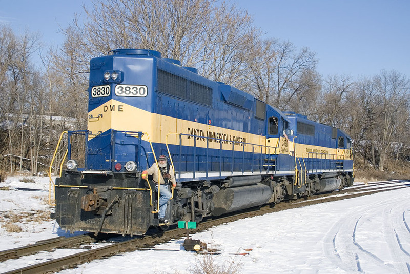 IC&E's West Davenport Switcher heads west along the Golden State Route after interchanging with the IAIS.  Division St; Davenport, IA.  18-Dec-2007
