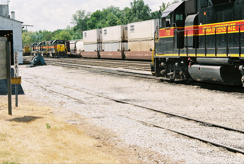 Various power and CSXU containers at Iowa City, July 18, 2005.