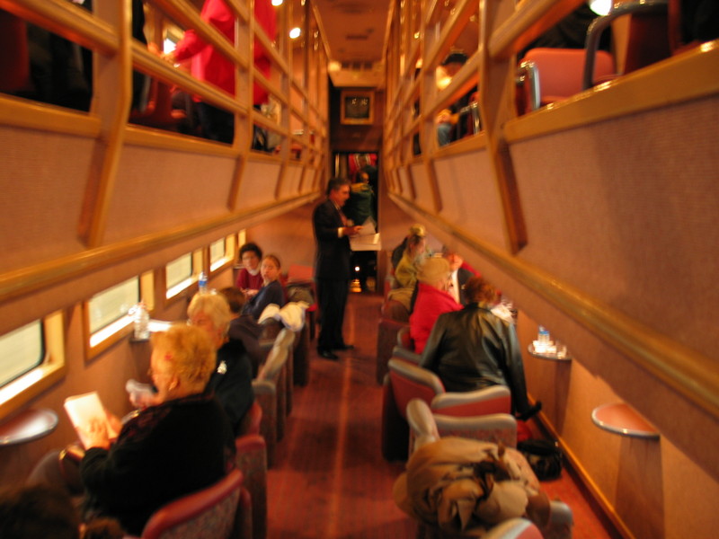 Back half of the dance car, which retained its gallery seating, with parlor seats installed on the lower level.