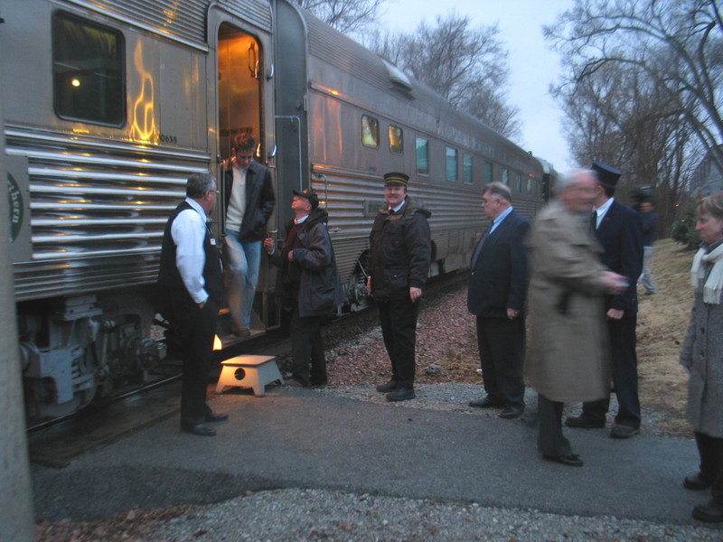 IAIS listmember, Cedar Rapids Railfans member and friend Ken May assists deboarding passengers at Iowa City.