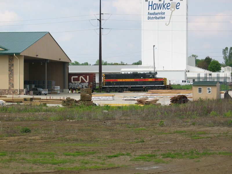 Local spotting a boxcar at Beisser Lumber west of Coralville.  May 15, 2006.