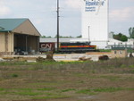 Local spotting a boxcar at Beisser Lumber west of Coralville.  May 15, 2006.