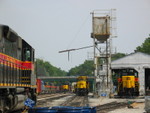 Iowa City yard, Aug. 2, 2007.  At immediate left is the CR job's power, pulling out of 3 track; 601 and the slug are sitting farther back on 4.  Pulling eastward up the siding in the background is the coal train's power, returning with extra manifest from Cedar Rapids, and beyond it, barely visible on the main, are coal loads headed to Cedar Rapids.