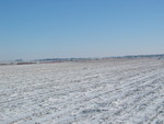 Kind of a crummy photo but I wanted one that showed the entire train.  Combined turn/westbound west of Walcott, Jan. 19, 2007.