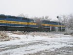 CP train 171 passes the new distant signal west of Cotter, Iowa, Jan. 21, 2010.