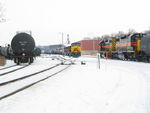 At the west end of RI Yard, the WB crew is setting out 513 while the RISW crew waits, out of the way on the Milan branch.