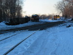 Passing derailed cars at Colona.