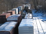 The RI crew is setting out local stuff off the eastbound, shoving it into 1 track on top of some local cars already there.