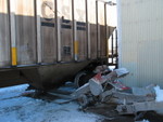 Unloading belt.  I like the old sheet metal seed corn sign being used as a chute!